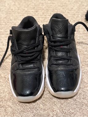 Jordan Kids Black and White High-Top Sneakers